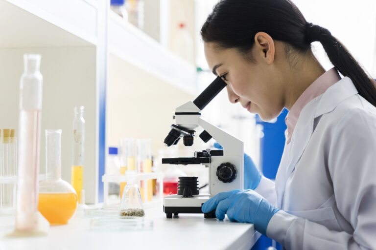 Student using a microscope during a science lesson