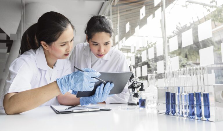 Students working together on a science experiment in a lab