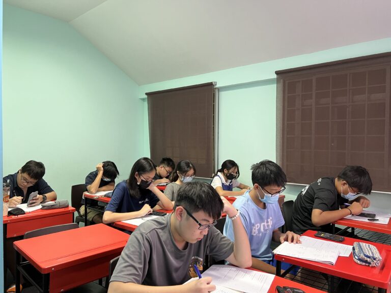 Students studying at Stepping Stones Learning Centre and completing worksheets